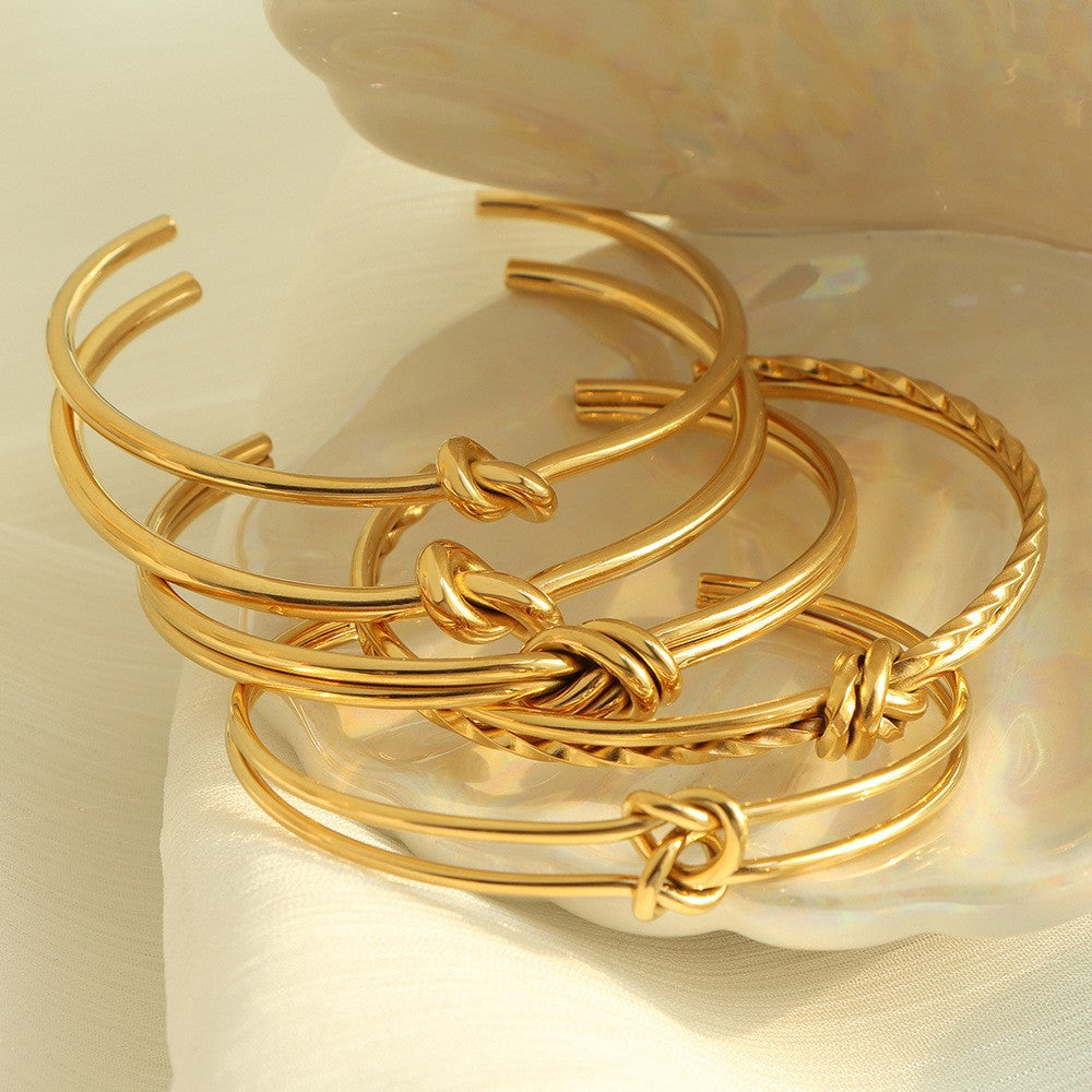 Pulseira Nodus com nó, banho dourado