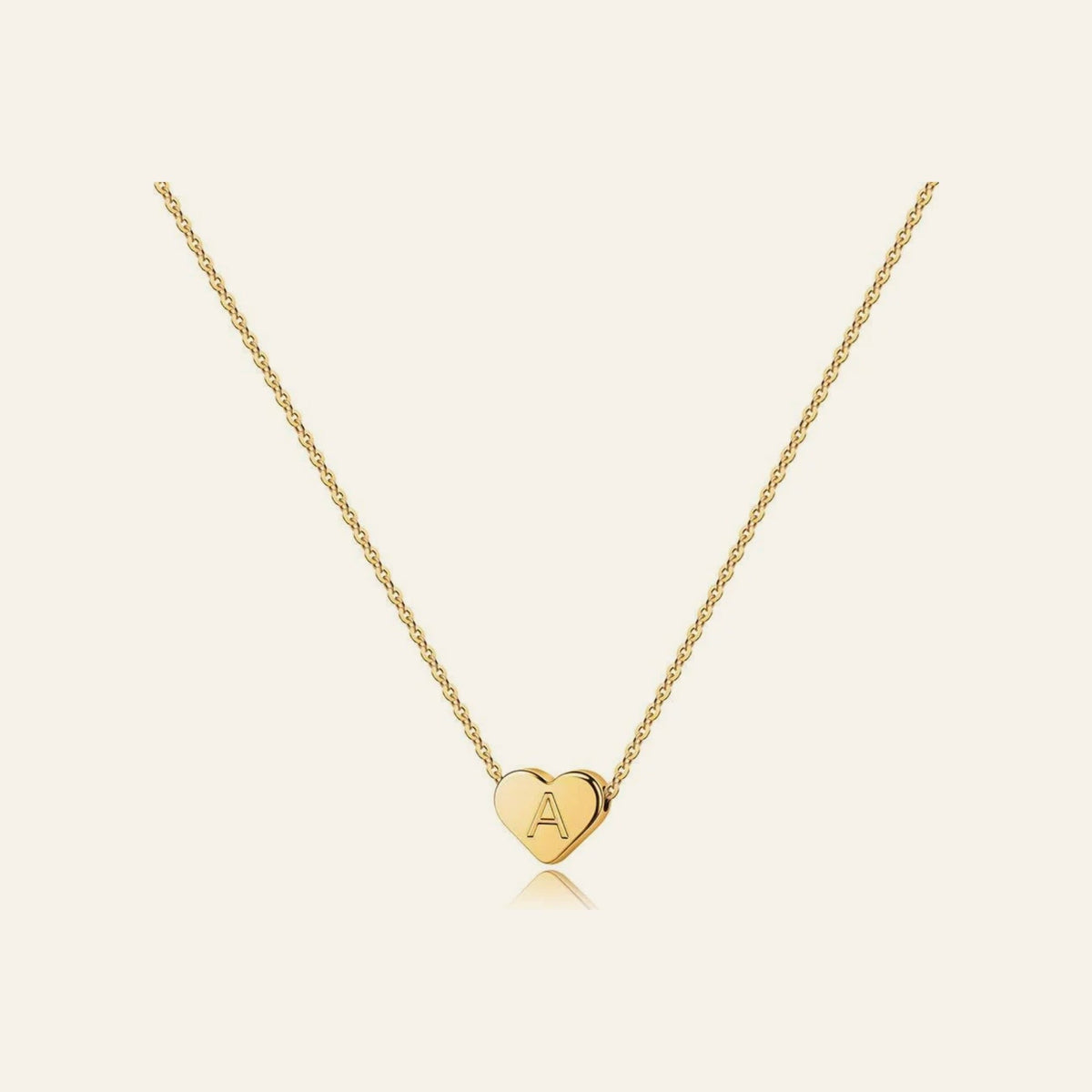 Colar Littera VIATRIX – colar coração com inicial, banho dourado