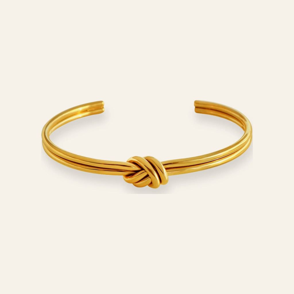 Pulseira Nodus VIATRIX – pulseira rígida com nó banhada a ouro